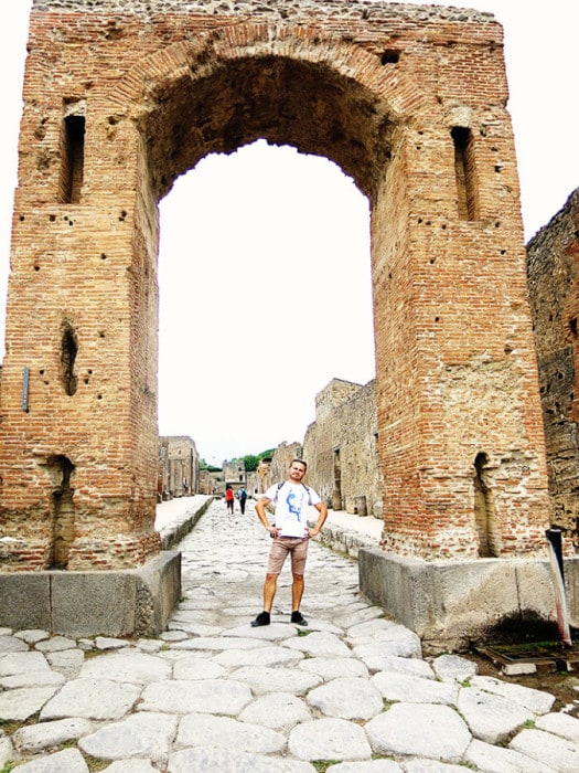 Pompei, Italy, man under the arch in Pompei