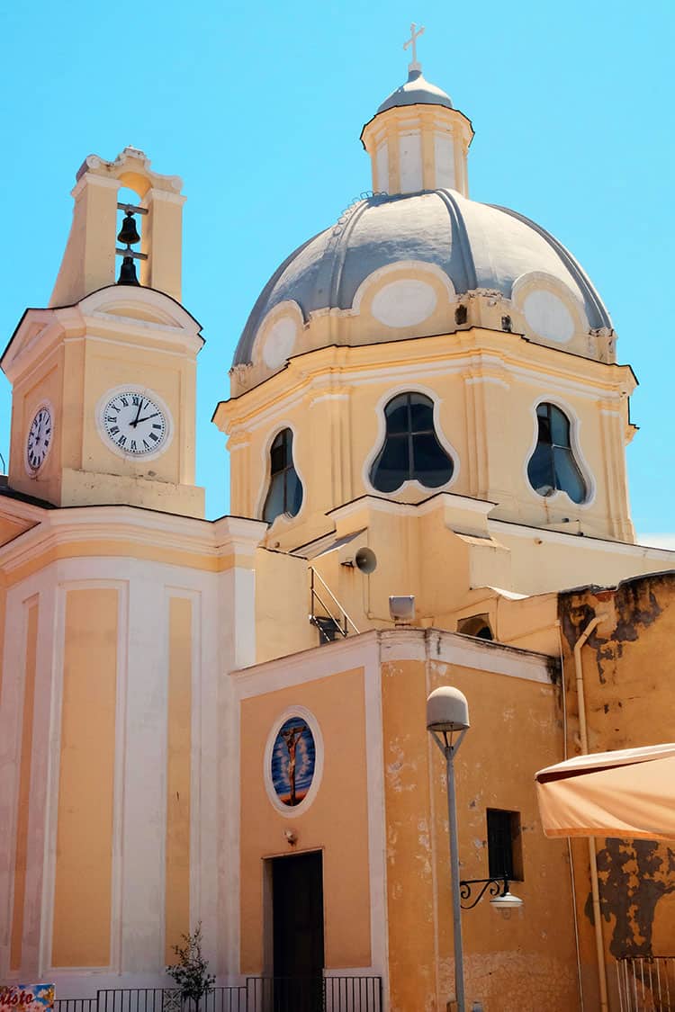 Santa Maria Delle Grazie church in Procida Italy, yellow and white building
