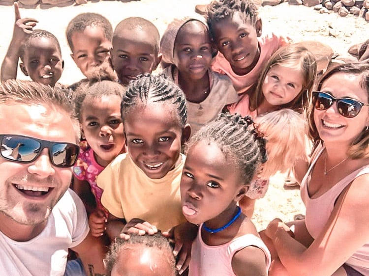 Meet the Locals in Spitzkoppe in Namibia with Kids, mother, father and daughter with local kids