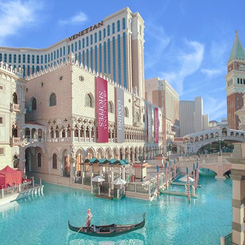 The Venetian, best family-friendly hotels in Las Vegas, gondola on the canal, restaurants and resort view, square image
